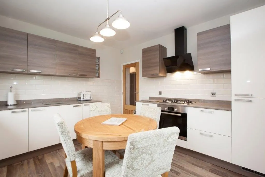 Walnut and white gloss family kitchen